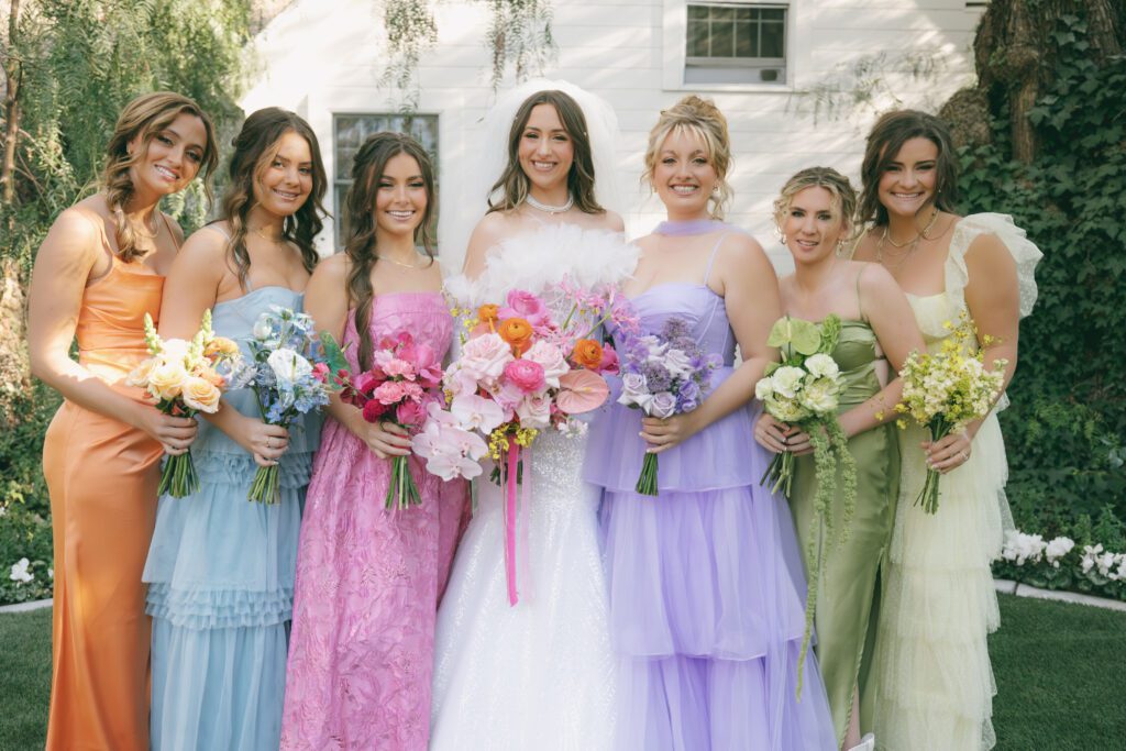 2025 Wedding Trends - Color-blocking bridesmaid dresses. Florals by The Bloom of Time.