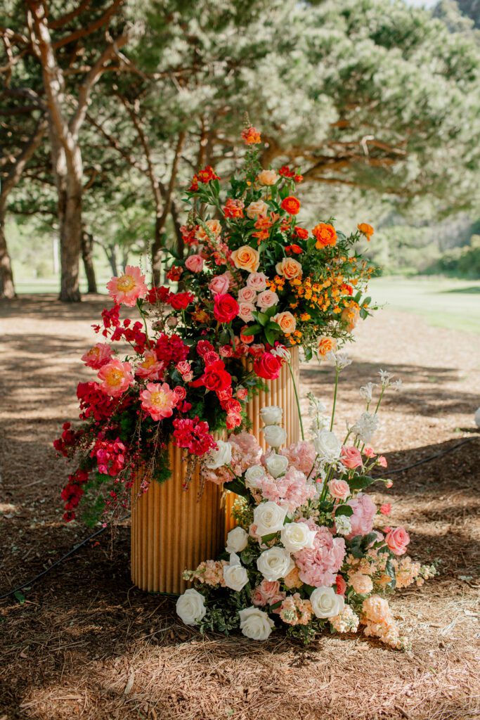2025 Wedding Trends - Using pillars or pedestals in ceremonies. Florals by The Bloom of Time.
