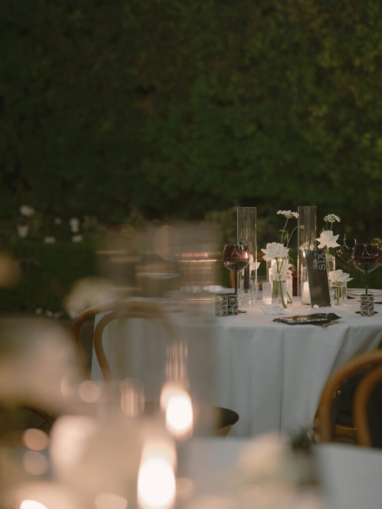 Popular Wedding Florals of 2025 - Flexed roses used in bud vase centerpieces arrangements. Florals by The Bloom of Time.