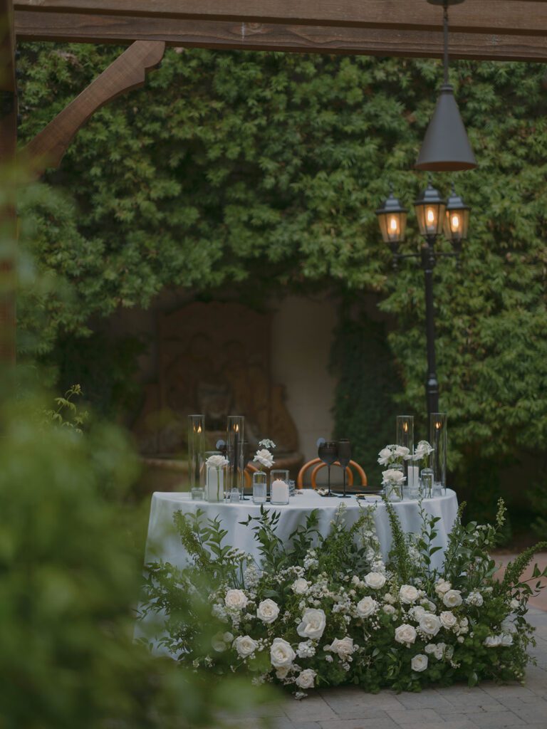 Popular Wedding Florals of 2025 - Flexed roses used in bud vase centerpieces arrangements. Florals by The Bloom of Time.